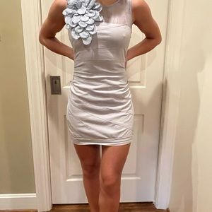 Vintage mini dress with giant flower detail on the shoulder